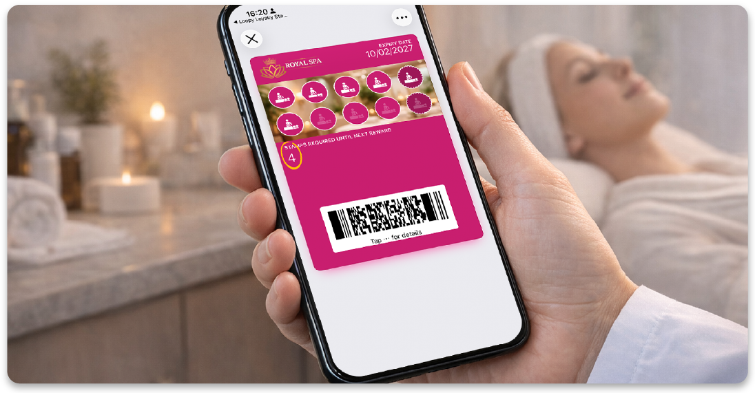 Digital health and wellness loyalty card displayed on a smartphone during a spa treatment